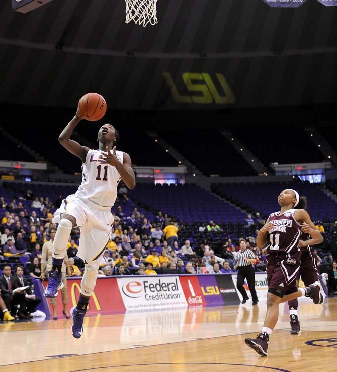 LSU freshman guard Raigyne Moncrief (11) attempts a lay up Thursday, Jan. 30, 2014 during the Lady Tigers' 65-56 victory against Mississippi State in the PMAC.