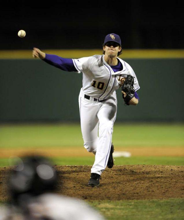 LSU junior pitcher Aaron Nola (10) throws between innings Friday, Feb. 28, 2014 during the Tigers' win against Yale in Alex Box Stadium.