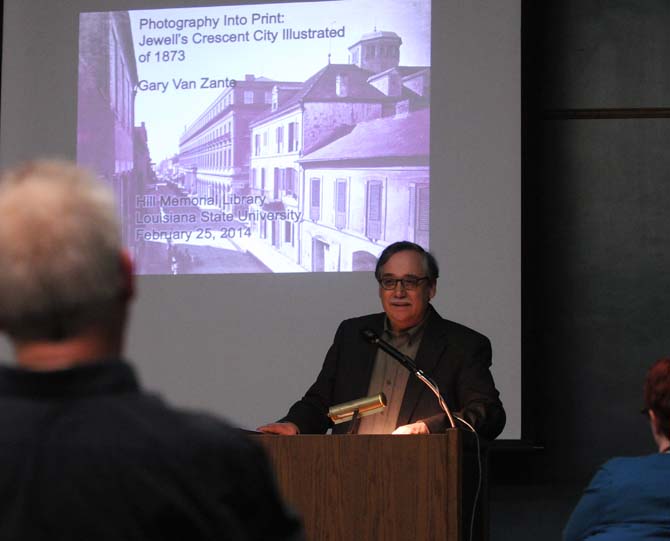 MIT Museum curator and author Gary Van Zante discusses his upcoming project with LSU Press on Tuesday, Feb. 25, 2014 while referencing "Jewell's Crescent City, Illustrated" of 1873 at Hill Memorial Library.