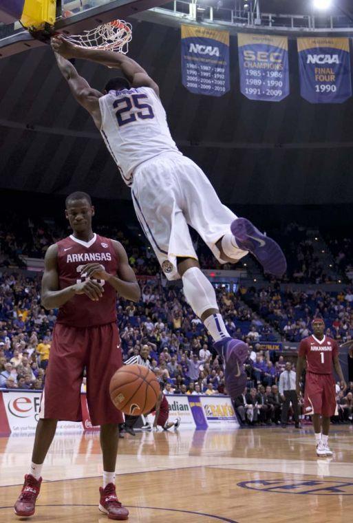 LSU freshman forward Jordan Mickey (25) dunks the ball Saturday, Feb. 2, 2014, during the Tigers' 99-74 victory against Arkansas in the PMAC.