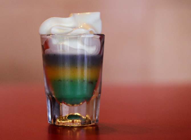 Reginelli's Pizzeria on West Chimes Street offers a king cake jello shot during Mardi Gras season.