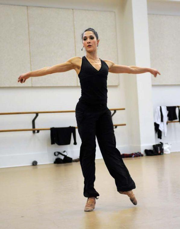 A member of River North Dance Chicago performs a floor exercise Monday, Feb. 10, 2014 in the Music and Dramatic Arts Building.