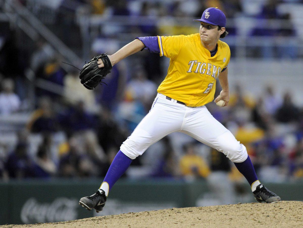 LSU junior left handed pitcher Cody Glenn (24) prepares to throw the ball to home plate Sunday, Feb. 16, 2014 during the Tigers' 6-0 victory against Grambling State University in Alex Box Stadium.