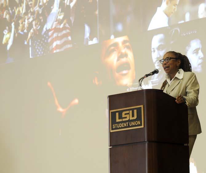 Kimberl&#233; Crenshaw, Executive director of the African American Policy Forum and professor of law at UCLA and Columbia Law School, speaks to students Friday, Feb. 21, 2014 about race and "intersectionality", a concept she coined to capture the multidimensional dynamics of discrimination.