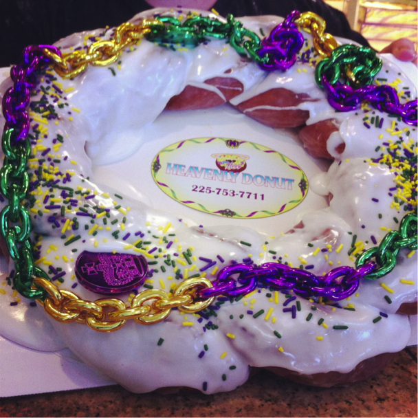 Why They Take The Cake: Thee Heavenly Donut is a rising star on the king cake scene. Their cakes are made from homemade donut dough and deep fried, making their cake crispy on the outside and moist on the inside. Owner Kara Castille highlights the fact that her Cajun heritage &#8220;brings culture to the cakes.&#8221;Lagniappe: For all of you Lafayette kids craving Meche&#8217;s, your prayers have been answered:&#160; Thee Heavenly Donut uses the same recipe. Castille is the granddaughter of Mrs. Meche, the founder of Meche&#8217;s Donuts. In lieu of college, she brought the family business to Baton Rouge while making a new name for herself. Their bananas foster king cake uses real rum and bananas, giving the cake a robust flavor. If you&#8217;re not interested in venturing from the familiar, I&#8217;d suggest their plain flavor, which is a classic for good reason.&#160;