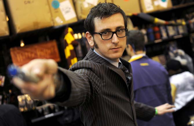 Merchandise vendor Thomas cosplays as the "10th Doctor" from the Doctor Who series Saturday, Feb. 8, 2014 at the Wizard World New Orleans Comic Convention held at the New Orleans Convention Center.