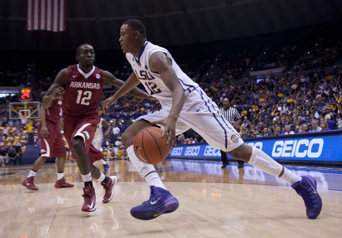 LSU freshman forward Jarell Martin (12) runs toward the basket Saturday, Feb. 2, 2014, during the Tigers' 88-74 victory against Arkansas in the PMAC.