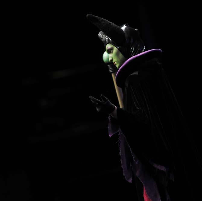 A cosplay contestant performs as "Malificent" Saturday, Feb. 8, 2014 during the Wizard World New Orleans New Orleans Comic Con costume contest at the New Orleans Theater inside the New Orleans Convention Center.