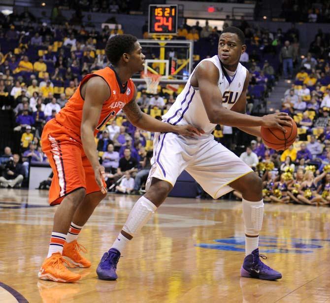 LSU freshman forward Jarell Martin fights to keep possession Saturday, Feb. 8, 2013 during the Tigers' 87-80 victory against Auburn Tigers in the PMAC.