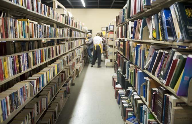 In this file photo from March 20, 2014, shoppers browse the stacks at the LSU Libraries Friends of the Libraries Annual Book Bazaar.