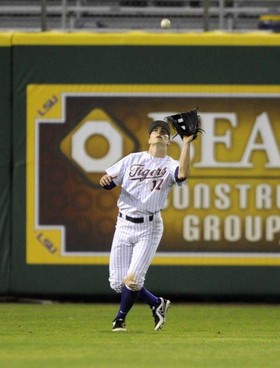 LSU junior outfielder Jared Foster (17) catches the ball Tuesday, March 11, 2014 during the Tigers' 5-3 win against Nicholls State.