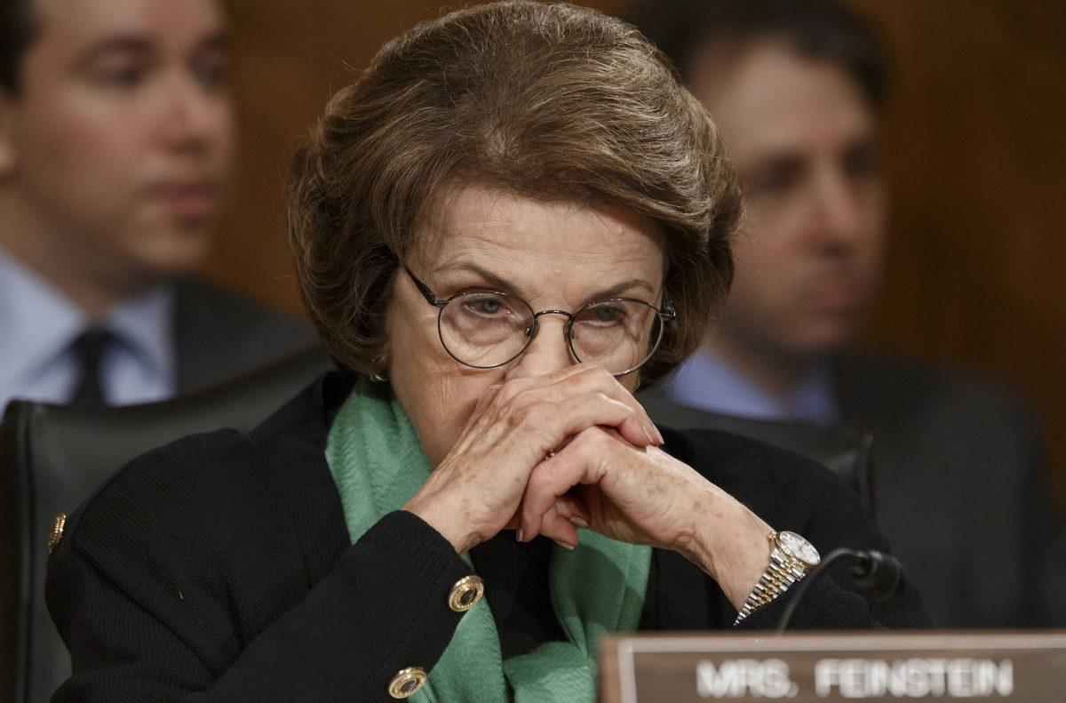 File- This March 13, 2014, file photo shows Senate Intelligence Committee Chair Sen. Dianne Feinstein, D-Calif., listening on Capitol Hill in Washington, during a Senate Transportation subcommittee hearing. In the aftermath of committee chairwoman Sen. Feinstein&#8217;s accusations that the CIA&#8217;s intimidating tactics and breaching of its constitutional authority for filing a criminal complaint against congressional aides, observers say the U.S. intelligence community and its congressional minders have committed serious missteps over the 13 years since the 9/11 terror attacks. (AP Photo/J. Scott Applewhite, File)