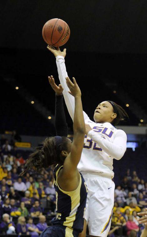 LSU sophomore guard Danielle Ballard (32) lays up the ball Sunday, March 23, 2014, during the Tigers' 98-78 win against Georgia Tech in the PMAC.