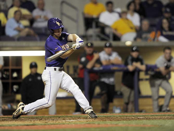 LSU sophomore infielder Alex Bregman (8) swings at the ball Saturday, March 22, 2014, during the Tigers' 2-1 win against Georgia in Alex Box Stadium.