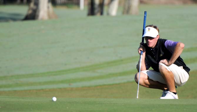 LSU junior golfer Curtis Thompson lines up his shot Saturday morning at the fourth-annual David Toms Intercollegiate held at The University Club.