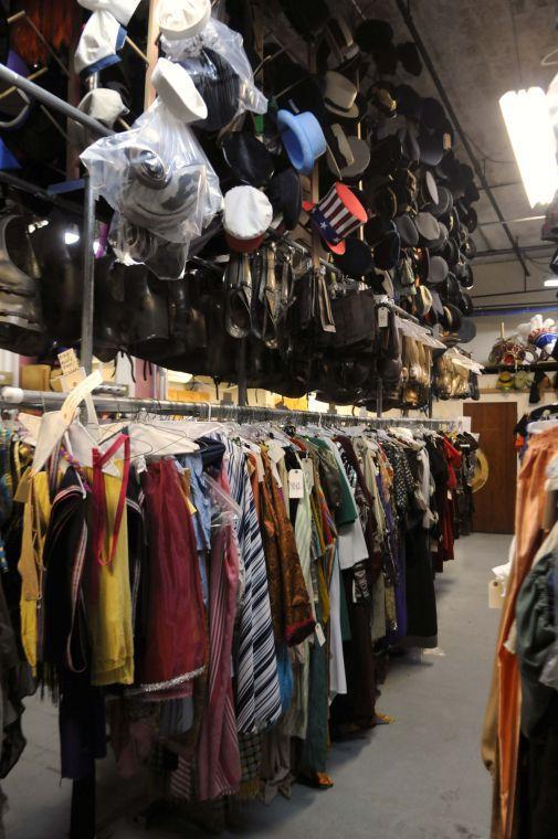 A rack of costumes with a variety of hats at Southern Costume Company in New Orleans.