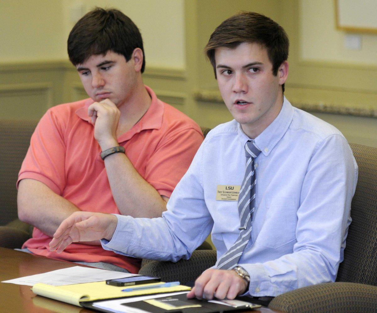 Speaker Pro Tempore Schwartzenburg (R) and Speaker Grashoff (L) speak during the Student Tech Fee Meeting on Thursday, March 20, 2014 at Thomas Boyd Hall.