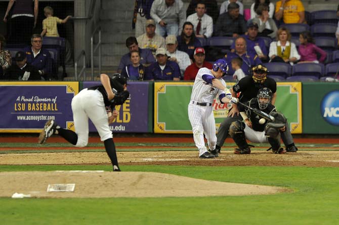 LSU senior outfielder Sean McMullen (7) swings at the ball Tuesday, March 11, 2014 during the Tigers' 5-3 win against Nicholls State.