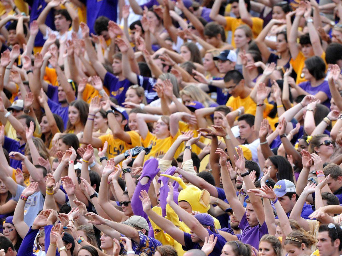 The LSU student section perform "Chinese Bandits," the song designated for when the Tigers regain posession of the ball, Saturday, Sept. 8, 2012 during the game against Washington in Tiger Stadium.