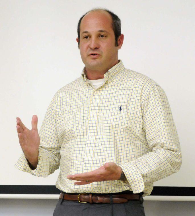 Libertarian candidate for US Senate Brannon McMorris speaks to the College Libertarians at LSU Monday, March 17, 2014 in Coates Hall.