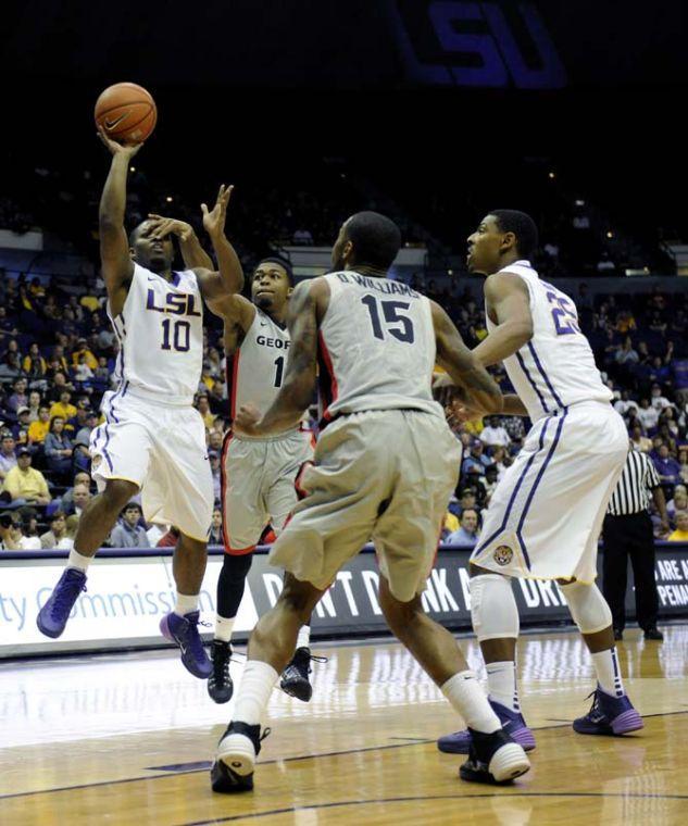 LSU senior forward Andre Stringer (10) shoots the ball during the Tigers' 61-69 loss to Georgia in the PMAC.