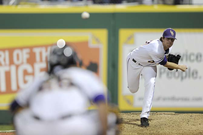 LSU junior pitcher Aaron Nola (10) warms up Friday, Feb. 21, 2014 during the Tigers' 9-0 victory against Virginia Tech at Alex Box Stadium.