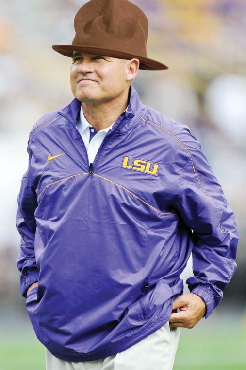 LSU football coach Les Miles smiles during pregame warmups before the Tigers' 41-14 victory against North Texas Sept. 1, 2012, in Tiger Stadium.