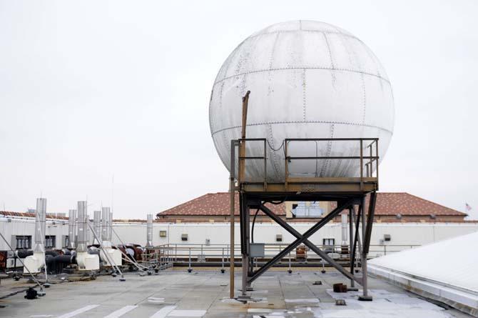 The visible infrared imaging radiometer suite, VIIRS, satellite sensor sits on top of the Howe Russell Geoscience complex Wednesday, Mar. 8, 2014 as it recieves information from the suomi national polar-orbiting partnership satellite currently in orbit.