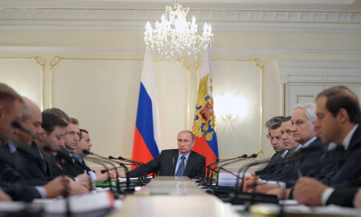 Russian President Vladimir Putin chairs a government meeting that focused on economic and social issues in the Novo-Ogaryovo residence outside Moscow, Russia, Wednesday March 19, 2014. (AP Photo/RIA-Novosti, Alexei Druzhinin, Presidential Press Service)