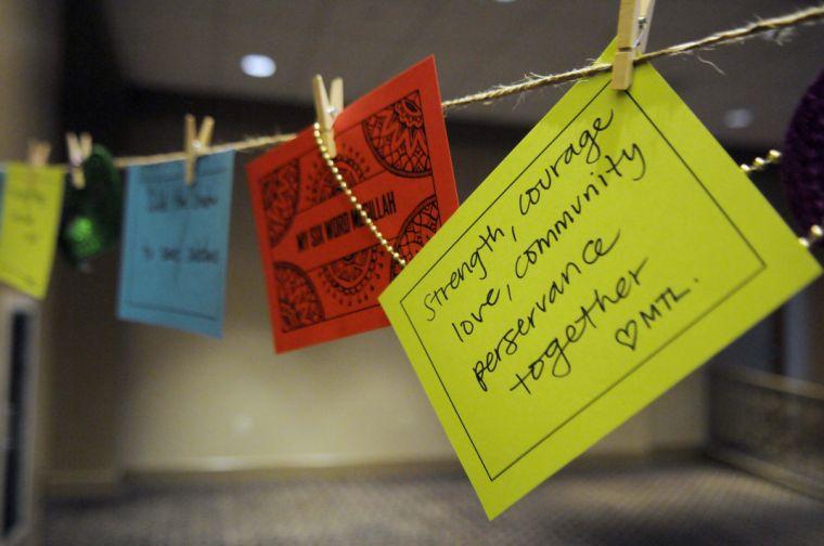 Festival attendees write six word megillahs at the TribeFest carnival Sunday, March 16, 2014 at Sheraton New Orleans Hotel.