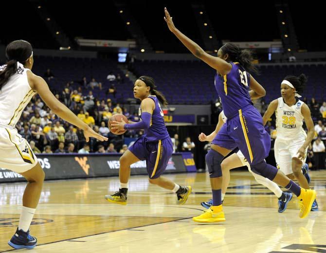 Lady Tigers come from behind to upset West Virginia, 76-67