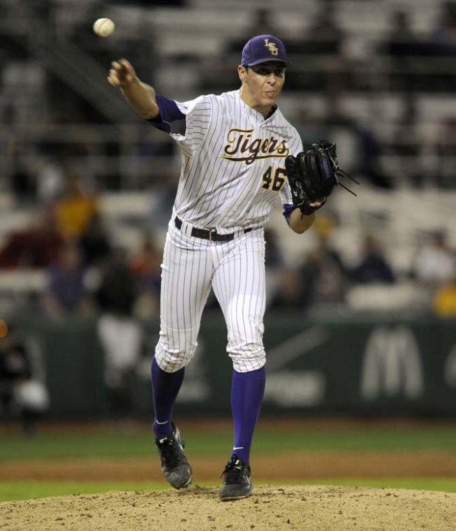 LSU freshman pitcher Parker Bugg (46) throws toward first Tuesday, March 11, 2014 during the Tigers' 5-3 win against Nicholls State in Alex Box Stadium.