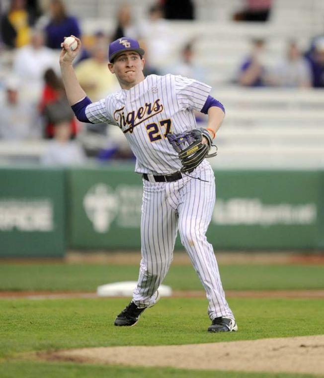 LSU freshman infielder Danny Zardon (27) throws toward first Tuesday, March 11, 2014 during the Tigers' 5-3 win against Nicholls State in Alex Box Stadium.