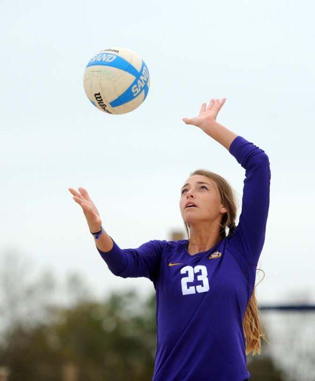 LSU junior sand volleyball player Helen Boyle (23) serves the ball Wednesday, March 26, 2014, during the Tigers' 3-2 lost against Tulane at Coconut Beach Sand Volleyball Complex.