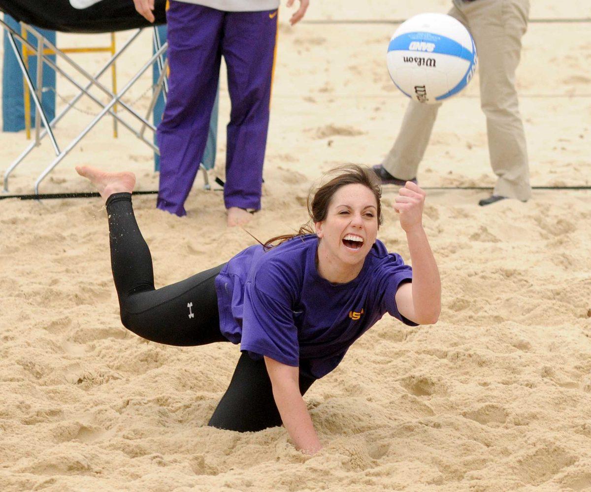 LSU sophomore Victoria Boraski dives for the ball Friday, Feb. 7, 2013 during practice at Mango's Beach Volleyball.