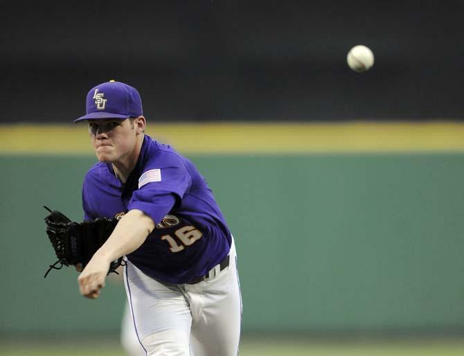 LSU freshman pitcher Jared Poche' (16) warms up between innings Saturday, Mach 22, 2014, during the Tigers' 2-1 win against Georgia in Alex Box Stadium.