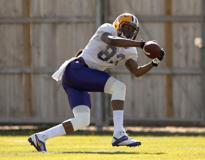 LSU sophomore wide receiver Travin Dural (83) catches a pass during a drill Tuesday, March 18, 2014 during practice at the Charles McClendon Practice Facility.