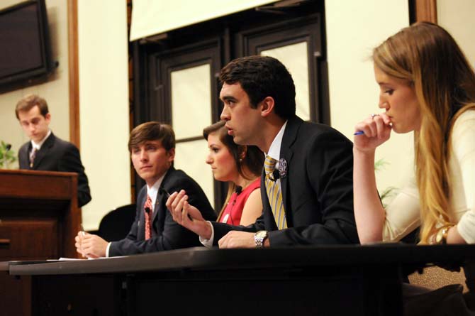 Student Government candidates discuss possible initiatives Monday, March 17, 2014 during the 2014 Student Government Debate held in the Holliday Forum.