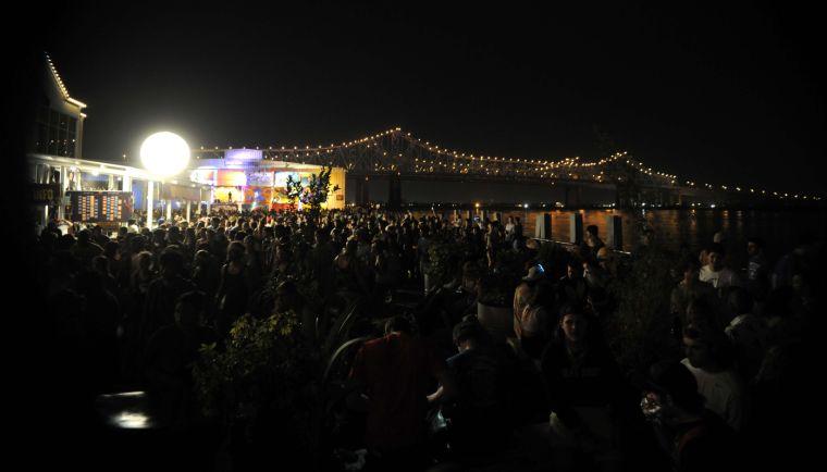 People flow from one stage to another during Buku Music + Art Project on Friday, March 21, 2014 at Mardi Gras World in New Orleans.