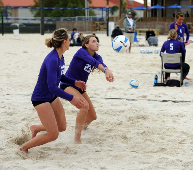 LSU junior sand volleyball player Helen Boyle (23) bumps the ball Wednesday, March 26, 2014, during the Tigers' 3-2 lost against Tulane at Coconut Beach Sand Volleyball Complex.