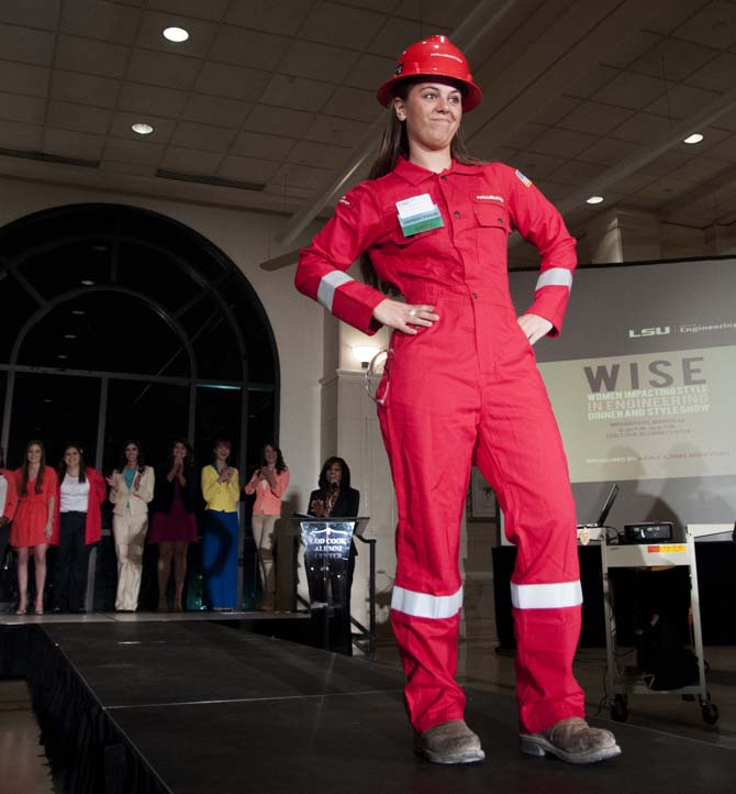 An engineering student at LSU models a jumpsuit Wednesday March 19, 2014, during the Women Impacting Style in Engineering (WISE) event in the LSU Faculty Club.