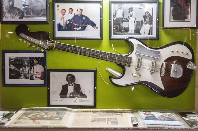 A guitar belonging to the famous Neal family is displayed Saturday, March 22, 2014 in The Rhythm Museum put on by the Buddy Stewart Music Memorial Foundation.