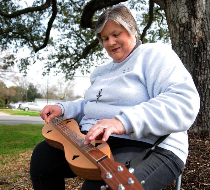 Lisa Oivaniki, co-chairman of the Dulcimer Festival, performs with her dulcimer March, 5, 2014 at the West Baton Rouge Parish Museum. The Dulcimer Festival begins March 6, 2014 and will run until March 9, 2014 at the West Baton Rouge Parish Museum in Port Allen, Louisiana.