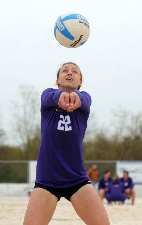 LSU senior sand volleyball player Kaitlin Hatcher (22) bumps the ball Wednesday, March 26, 2014, during the Tigers' 3-2 lost against Tulane at Coconut Beach Sand Volleyball Complex.