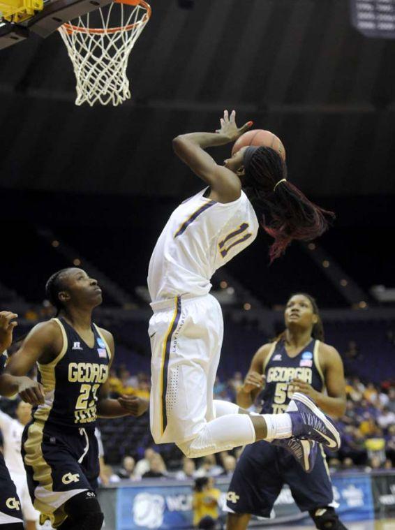 LSU freshman guard Raigyne Moncrief (11) shoots the ball Sunday, March 23, 2014, during the Tigers' 98-78 victory against Georgia Tech in the PMAC.