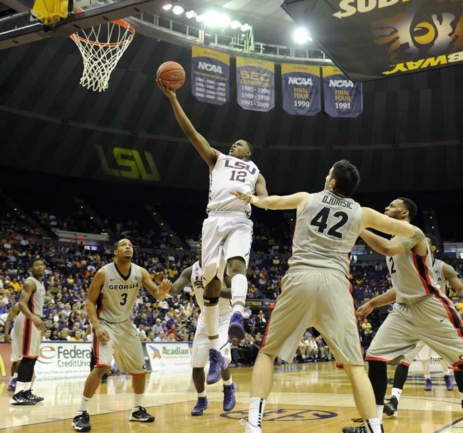 LSU freshman forward Jarell Martin (12) shoots the ball Saturday, March 8, 2014 during the Tigers' 61-69 loss to the Bulldogs in the PMAC.