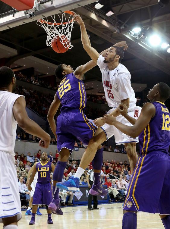 SMU Mustangs center Cannen Cunningham (15) dunks on LSU Tigers forward Jordan Mickey (25) in the first half of NIT Men's Basketball Tournament Second Round action at Moody Coliseum in University Park, Texas on Monday, March 24, 2014. (AP Photo/The Dallas Morning News, Brad Loper ) MANDATORY CREDIT; MAGS OUT; TV OUT; INTERNET USE BY AP MEMBERS ONLY; NO SALES