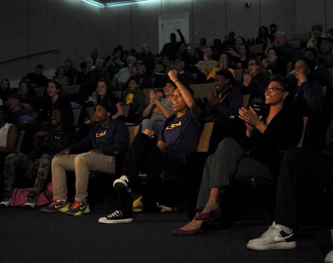 LSU women's basketball head coach Nikki Caldwell and the team celebrate with fans Monday, March 17, 2014 in the Lawton Room after hearing their placement in the NCAA Tournament.