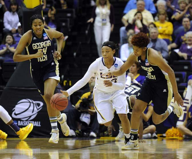 LSU sophomore guard Danielle Ballard (32) dribbles down the court Sunday, March 23, 2014, during the Tigers' 98-78 win against Georgia Tech in the PMAC.