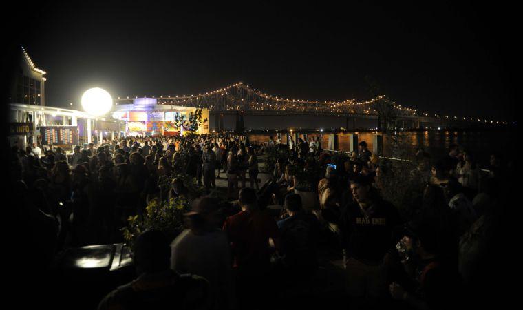 People flow from one stage to another during Buku Music + Art Project on Friday, March 21, 2014 at Mardi Gras World in New Orleans.